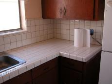 Basic kitchen counter top w/ backsplash, 4x4 ceramic tiles, plus Vcap edge